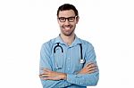 Confident Young Smiling Male Doctor Stock Photo