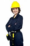 Confident Young Woman In Jumpsuit Stock Photo