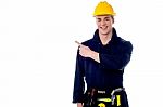 Construction Worker Pointing Away Stock Photo