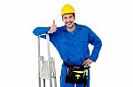 Construction Worker Posing With Step Ladder Stock Photo