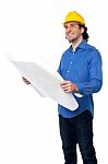 Construction Worker Reviewing Blueprint Stock Photo