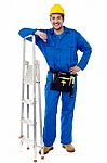 Construction Worker With Step Ladder Stock Photo