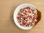 Corn In Ceramic Bowl On Wood Table Top View Stock Photo