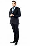 Corporate Guy Posing With Clasped Hands Stock Photo