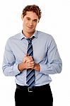 Corporate Guy Posing With Clasped Hands Stock Photo