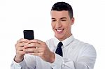 Corporate Guy Using Mobile Phone Stock Photo