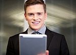 Corporate Guy Using Tablet Pc Stock Photo