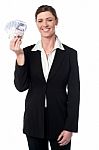 Corporate Lady Displaying Fan Of Pound Sterling Stock Photo