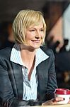 Corporate Lady Sitting In An Open Cafe Stock Photo