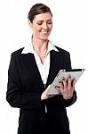 Corporate Lady Using A Tablet Device Stock Photo