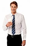 Corporate Man Holding Cold Beverage Stock Photo