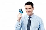 Corporate Man Holding Debit Card Stock Photo