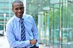 Corporate Man Poses Casually At Outdoor Stock Photo