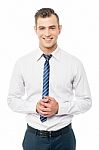 Corporate Man Posing With Clasped Hands Stock Photo