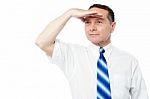 Corporate Man Searching For Something Stock Photo