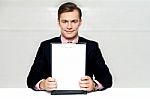 Corporate Man Showing Blank Clipboard Stock Photo