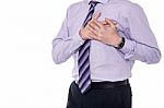 Corporate Man Suffering With Heart Attack Stock Photo