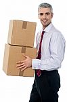 Corporate Man With A Cardboard Box In Hand Stock Photo