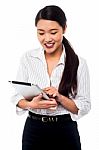 Corporate Woman Brwosing On Tablet Pc Stock Photo