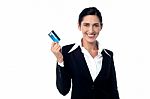 Corporate Woman Displaying Credit Card Stock Photo