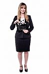 Corporate Woman Holding Clapperboard Stock Photo