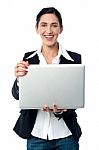 Corporate Woman Holding Laptop Stock Photo