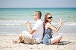 Couple Doing Yoga Stock Photo