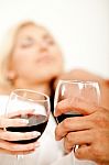 Couple Drinking Wine In Bed Stock Photo