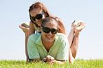 Couple Enjoying In Park Stock Photo