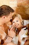 Couple Having Bath With Wine Stock Photo