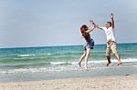 Couple Having Fun On Beach Stock Photo