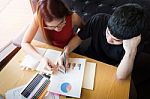 Couple Of Students In A Classroom Doing Homework Stock Photo