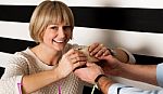 Couple Rejoicing Their Meal In Food Court Stock Photo