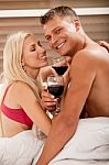 Couple Sharing Wine Stock Photo