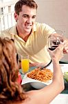 Couple Toasting Stock Photo