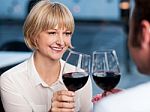 Couple Toasting In A Restaurant Stock Photo