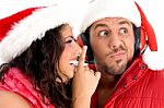 Couple Wearing Christmas Hat Stock Photo