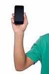 Cropped Image Of A Guy Displaying Mobile Handset Stock Photo