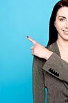 Cropped Image Of Businesswoman Pointing Stock Photo