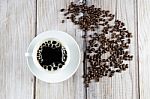 Cup Of Coffee And Coffee Beans Stock Photo