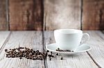 Cup Of Coffee And Coffee Beans Stock Photo