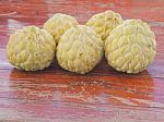 Custards On A Wooden Table. Sweet Fruit Of Thailand  Stock Photo