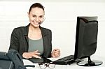 Customer Care Executive Using Tablet Pc Stock Photo