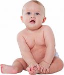 Cute Baby Boy Sitting On White Background Stock Photo