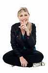 Cute Blonde Teen Gesturing Silence Stock Photo