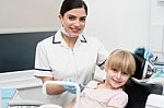 Cute Girl Child At Dental Clinic Stock Photo