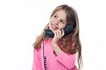 Cute Girl Child Speaking Over Phone Stock Photo