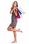 Cute Happy Woman Holding Her Shopping Bags Stock Photo