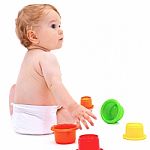 Cute Infant Boy With Toys Stock Photo