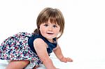 Cute Little Baby Girl Crawling Stock Photo